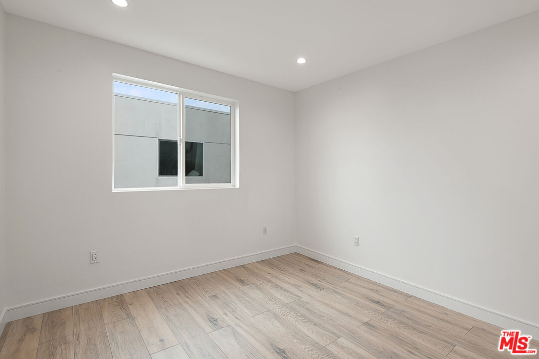 5464 Geer Street Los Angeles, CA 90016 - Photo 11 of 21 wooden floor in an empty room
