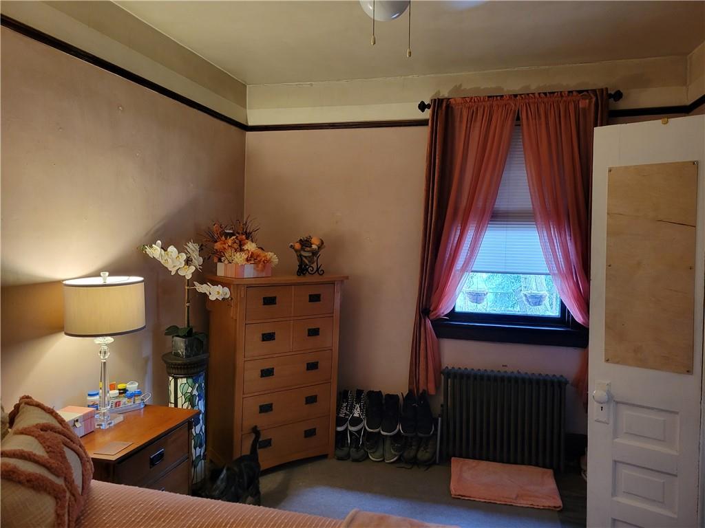 276 13th Street Ambridge, PA 15003 - Photo 12 of 25 a room with toys and a window