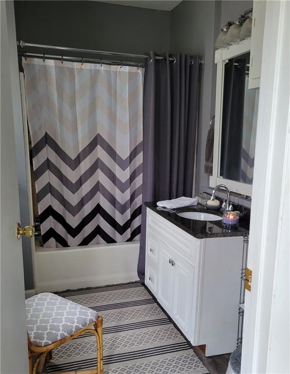 276 13th Street Ambridge, PA 15003 - Photo 13 of 25 a bathroom with a sink and a mirror