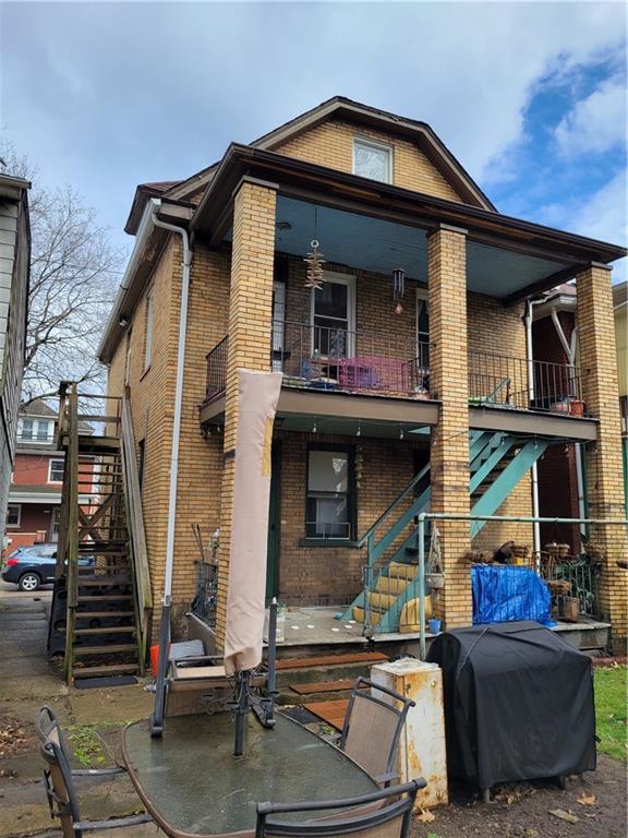 276 13th Street Ambridge, PA 15003 - Photo 3 of 25 a front view of a house with garden