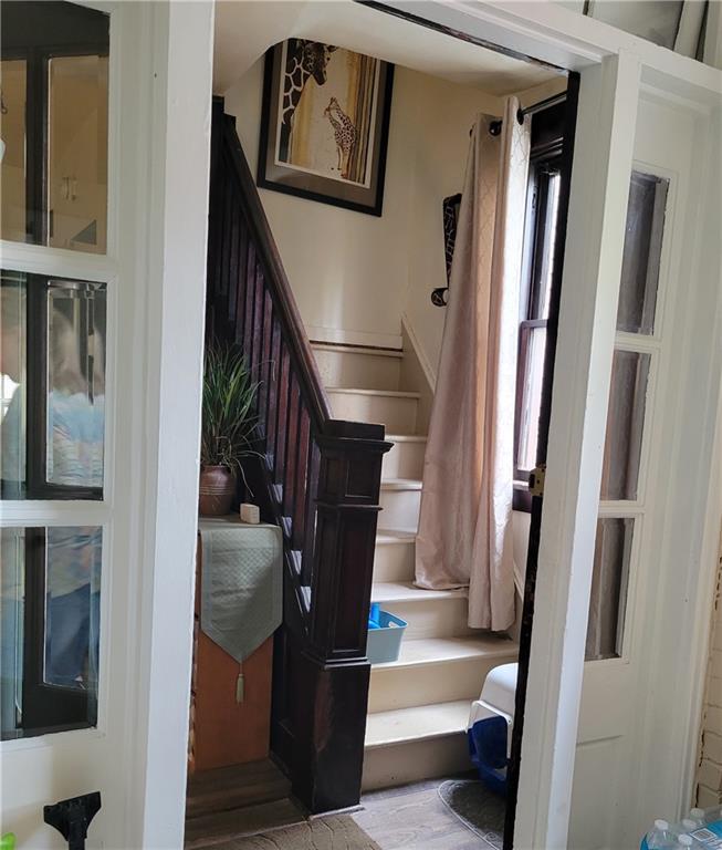 276 13th Street Ambridge, PA 15003 - Photo 5 of 25 a view of entryway and hall with wooden floor