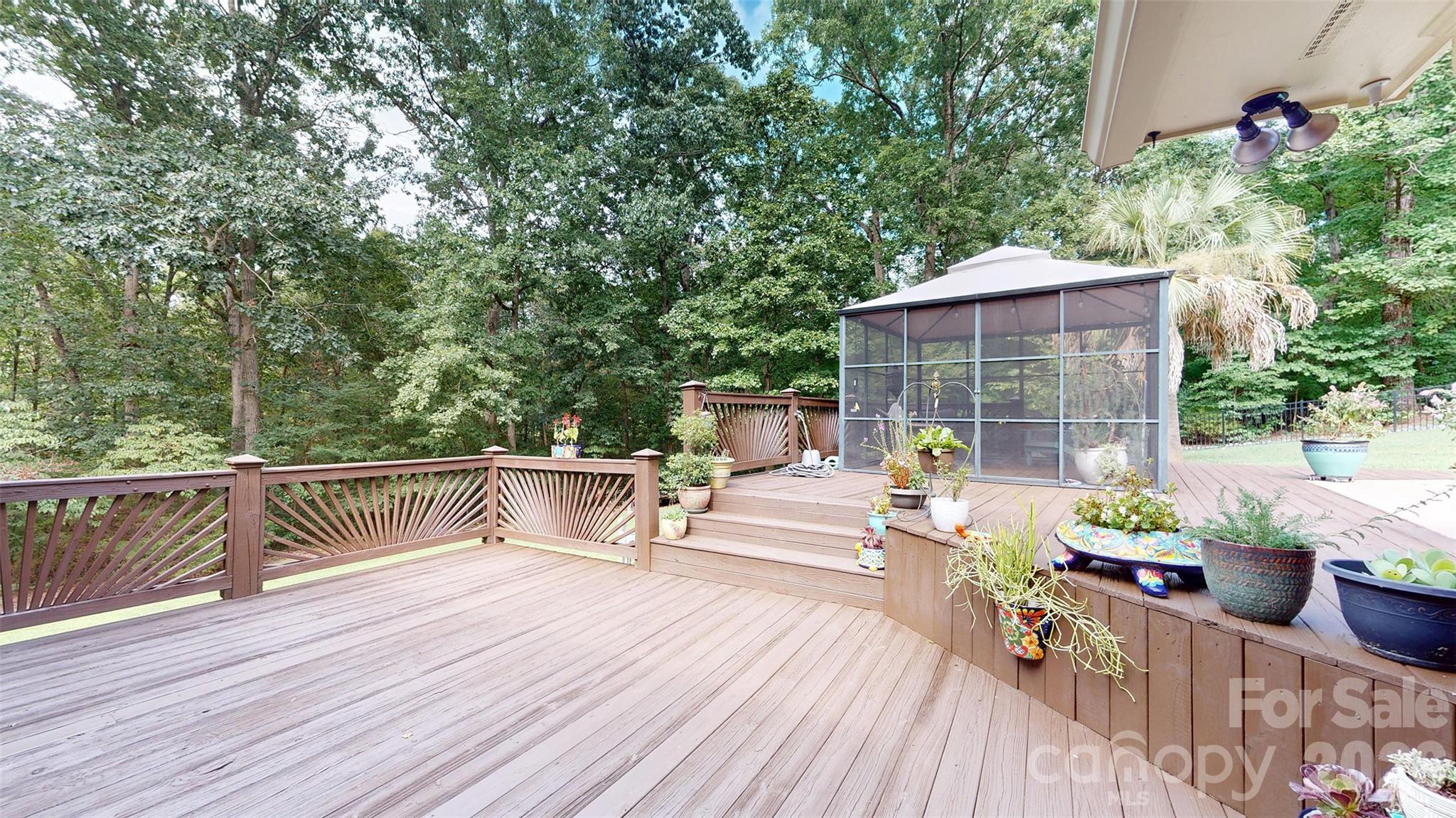 8720 Unionville-Brief Road Monroe, NC 28110 - Photo 29 of 35 a view of house with deck and outdoor seating