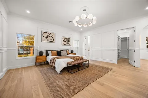 a bathroom with a toilet and shower