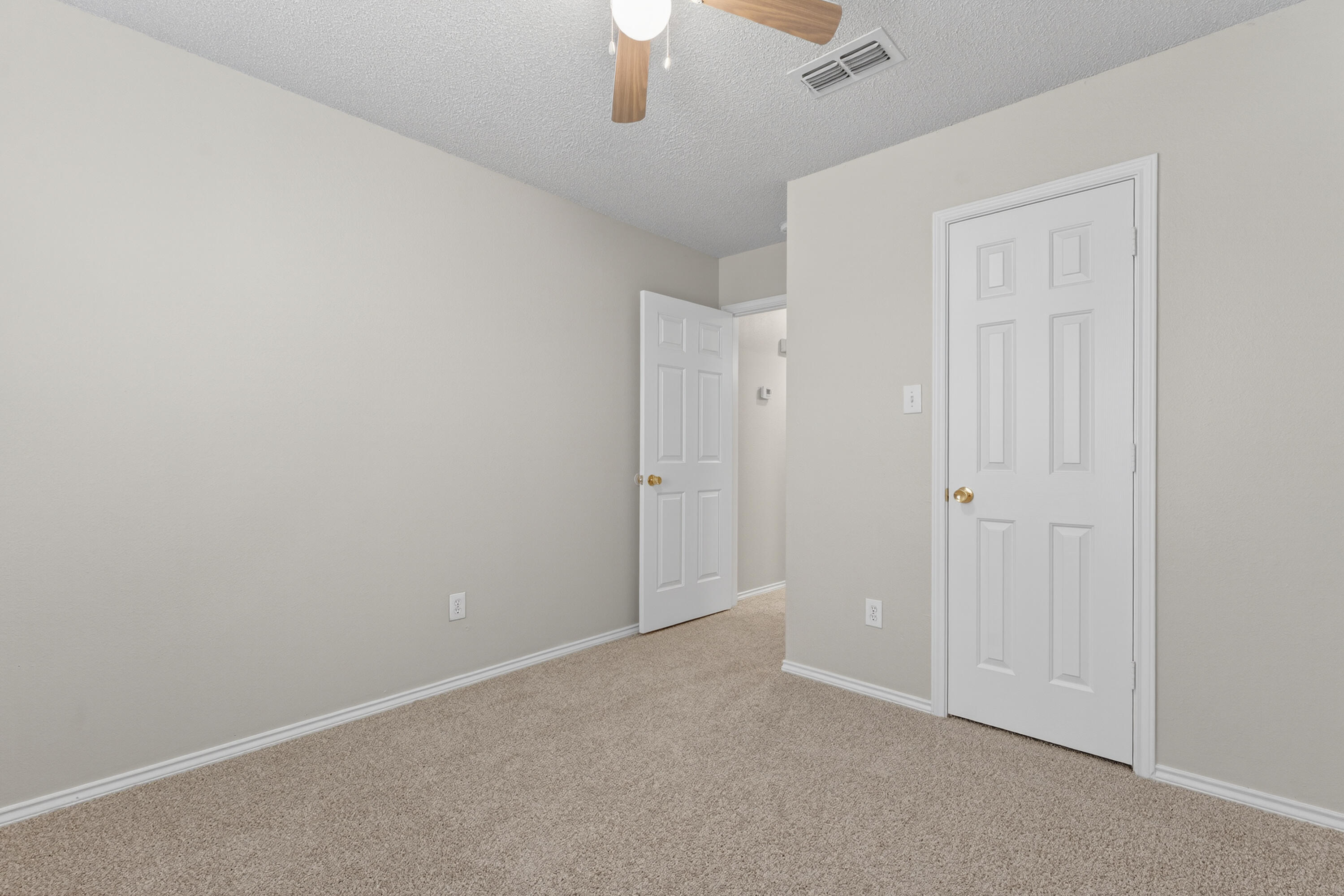 1805 75th Street Lubbock, TX 79423 - Photo 13 of 20 a view of an empty room