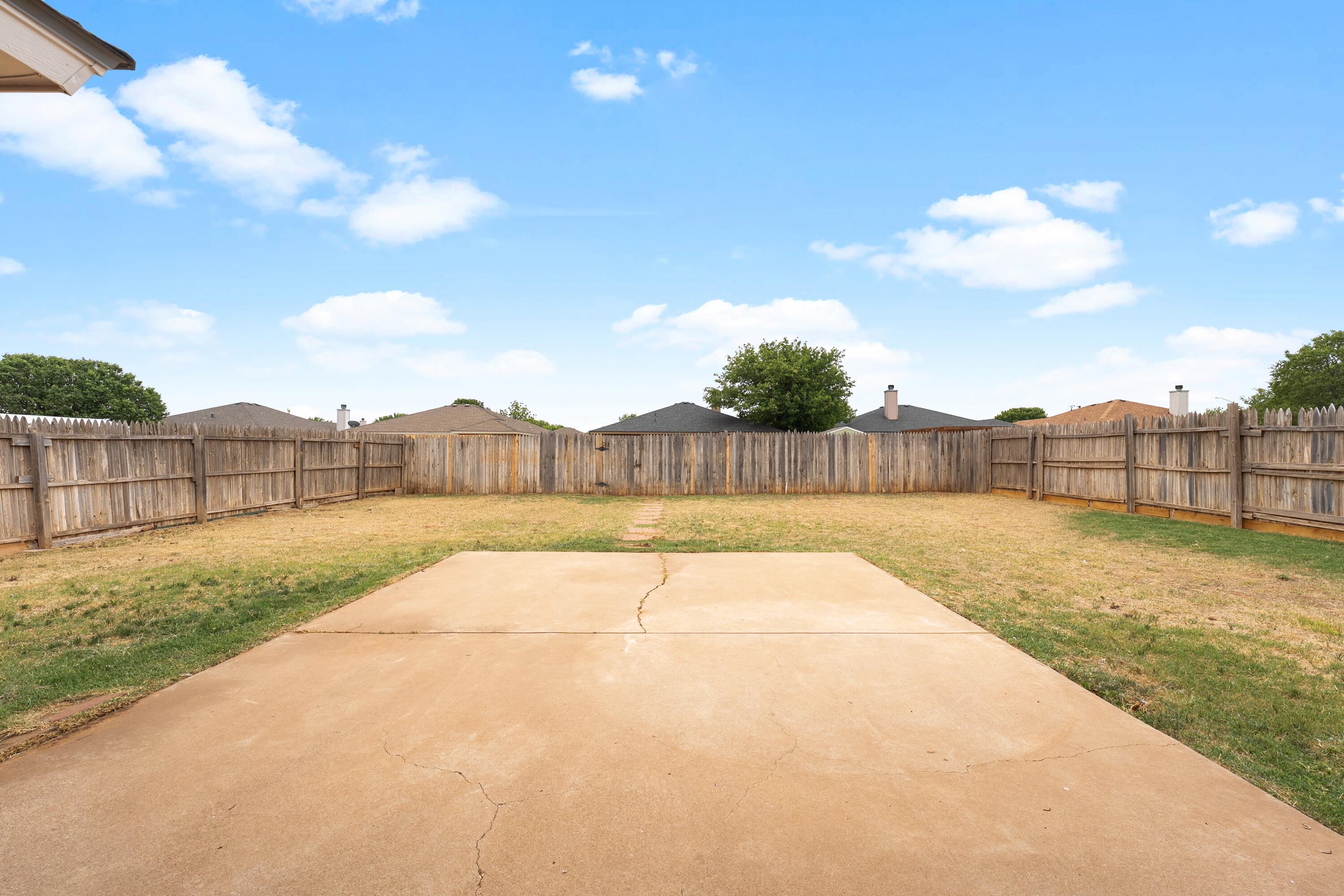 1805 75th Street Lubbock, TX 79423 - Photo 19 of 20 a view of an outdoor space and tennis court