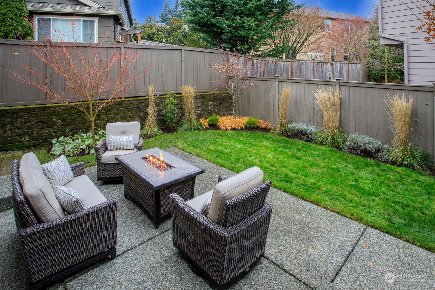 5314 Northeast 17th Place Renton, WA 98059 - Photo 14 of 40 a backyard of a house with table and chairs