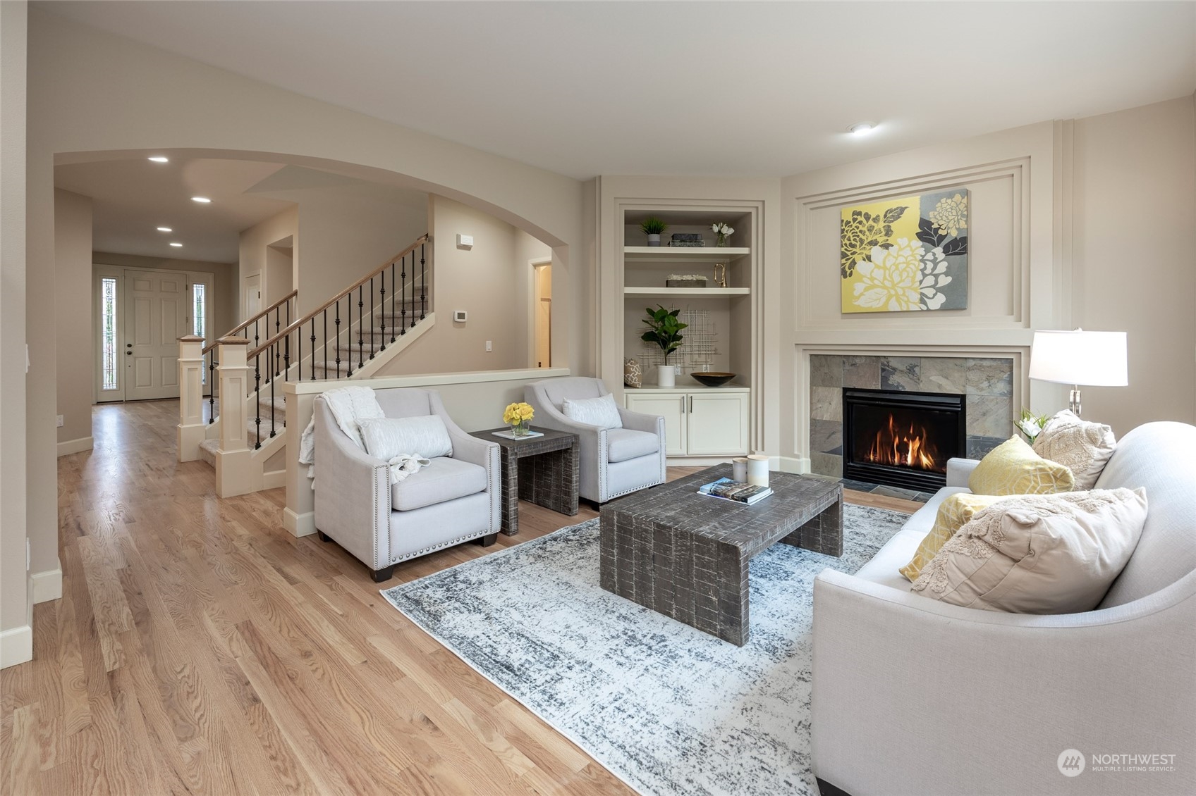 5314 Northeast 17th Place Renton, WA 98059 - Photo 16 of 40 a living room with furniture and a fireplace