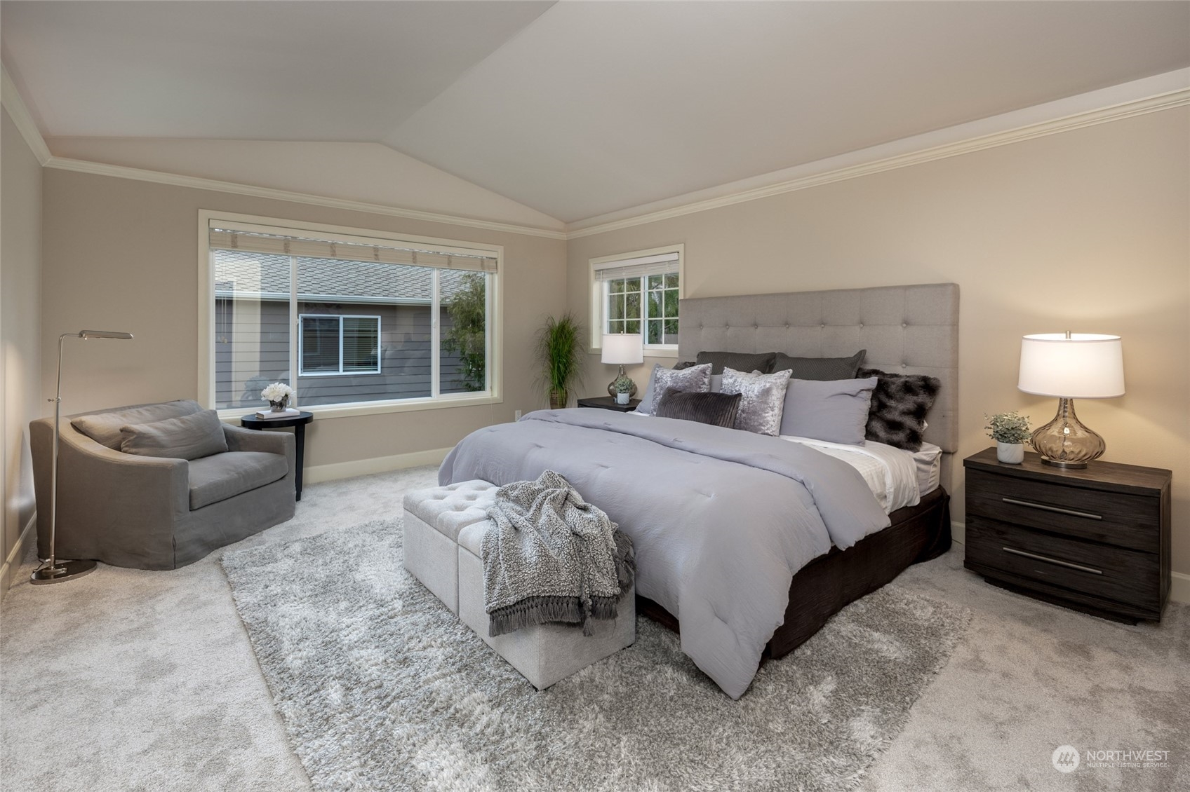 5314 Northeast 17th Place Renton, WA 98059 - Photo 20 of 40 a spacious bedroom with a bed and couch
