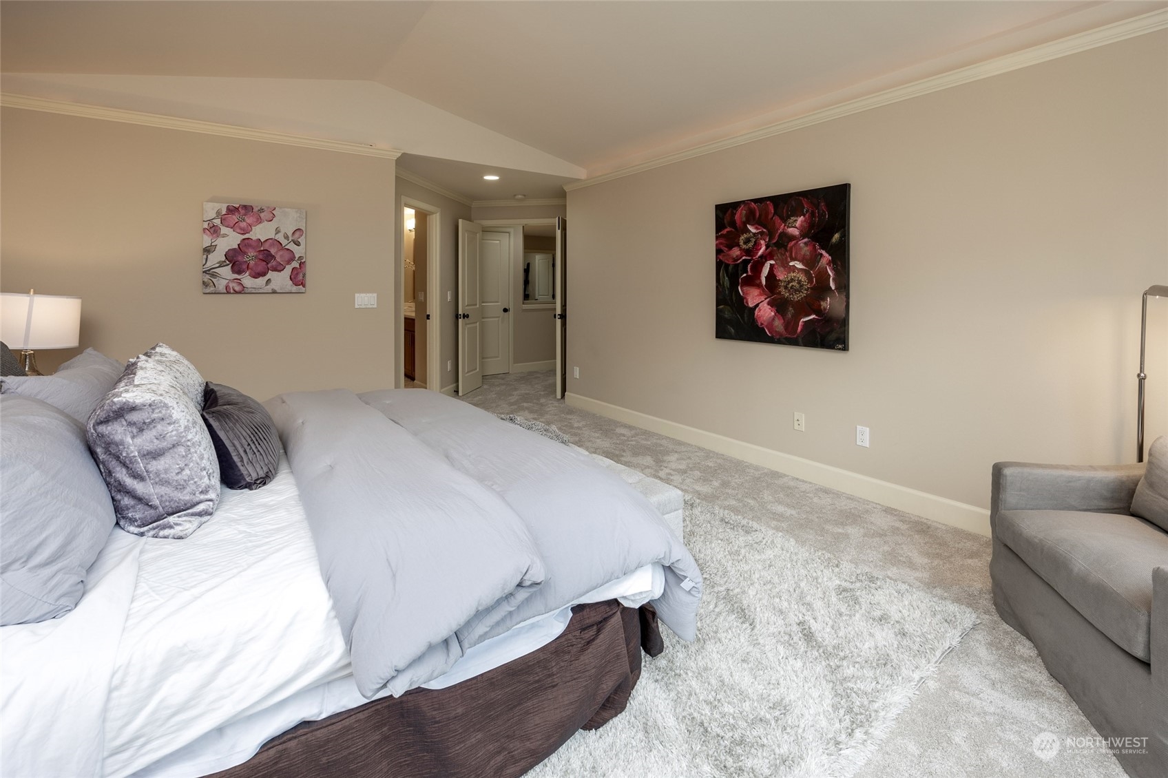 5314 Northeast 17th Place Renton, WA 98059 - Photo 24 of 40 a bedroom with a bed and a couch