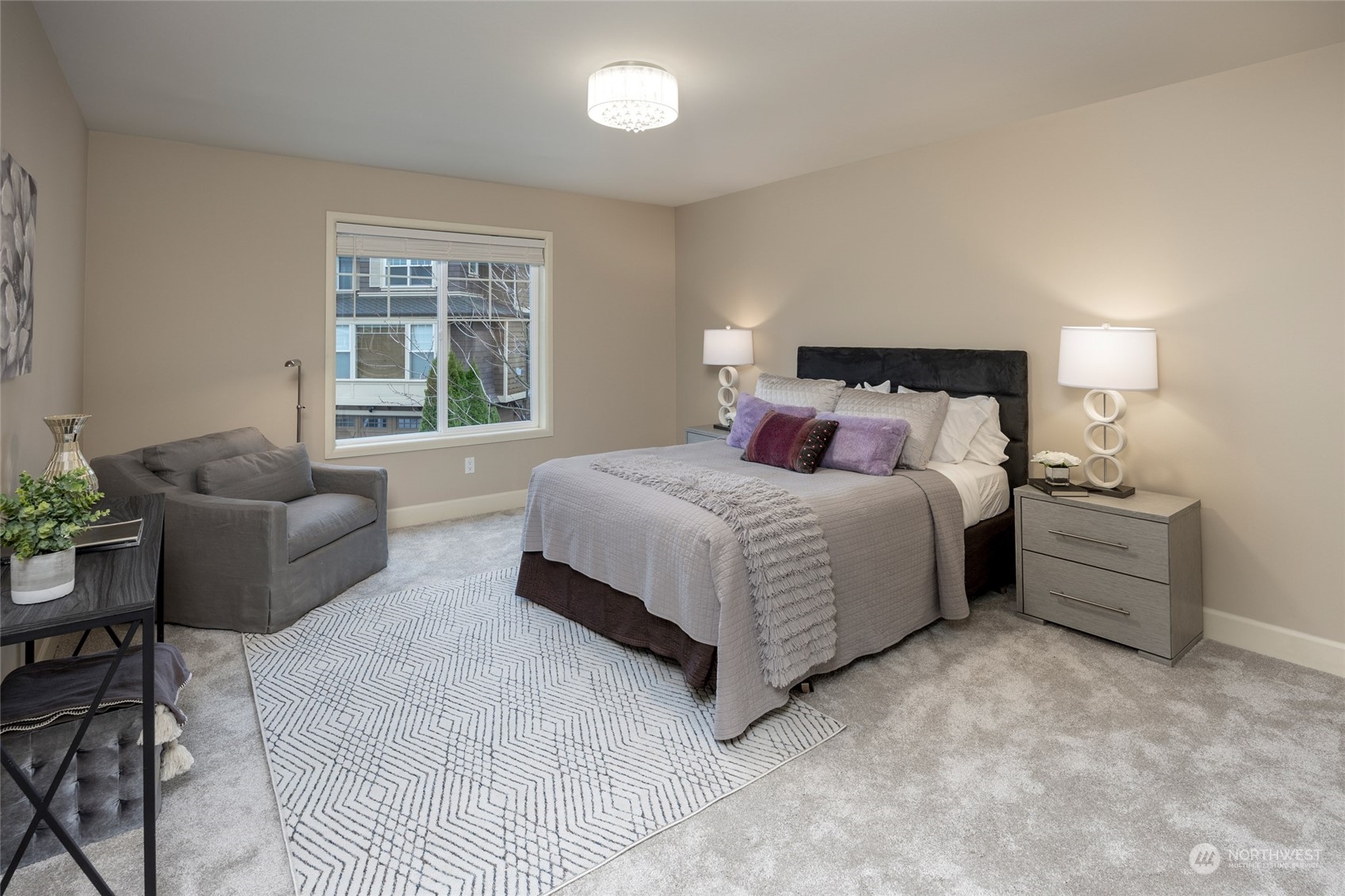 5314 Northeast 17th Place Renton, WA 98059 - Photo 28 of 40 a bedroom with a bed and a couch