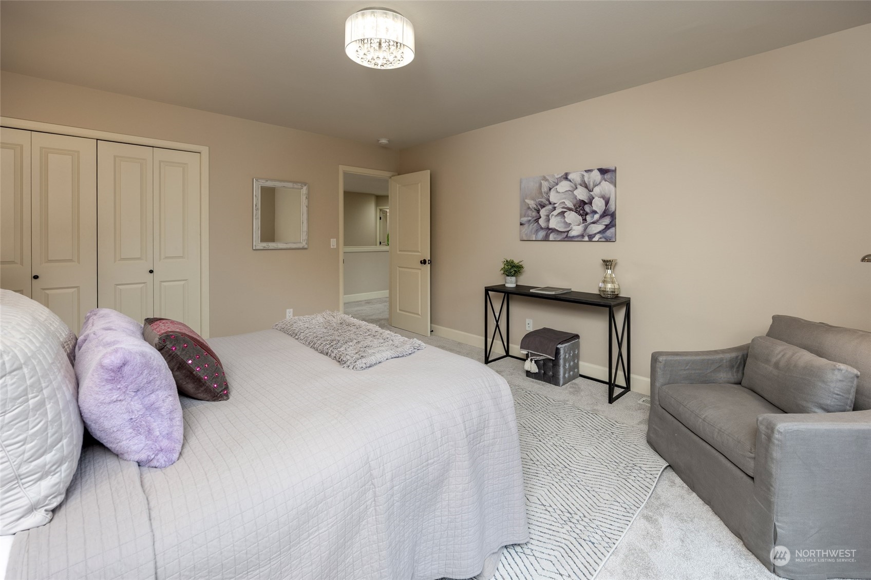5314 Northeast 17th Place Renton, WA 98059 - Photo 29 of 40 a bedroom with a bed and a couch