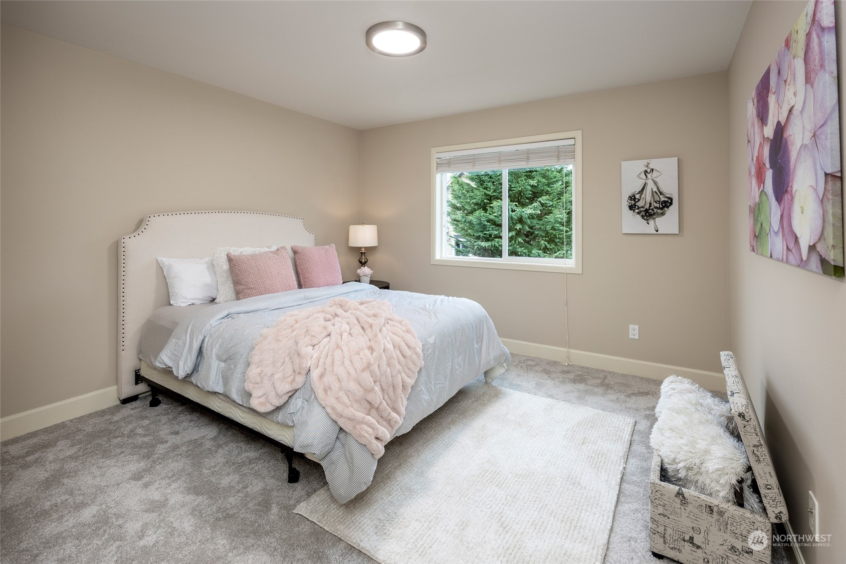 5314 Northeast 17th Place Renton, WA 98059 - Photo 31 of 40 a bedroom with a bed and a window