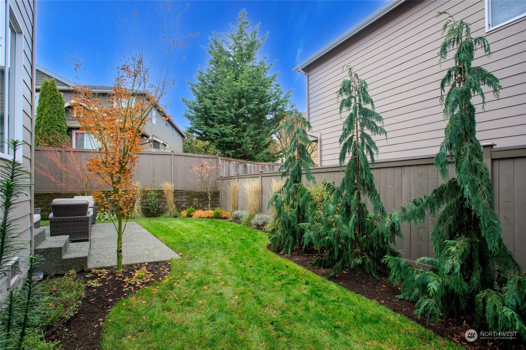 5314 Northeast 17th Place Renton, WA 98059 - Photo 36 of 40 a view of a house with a yard and potted plants