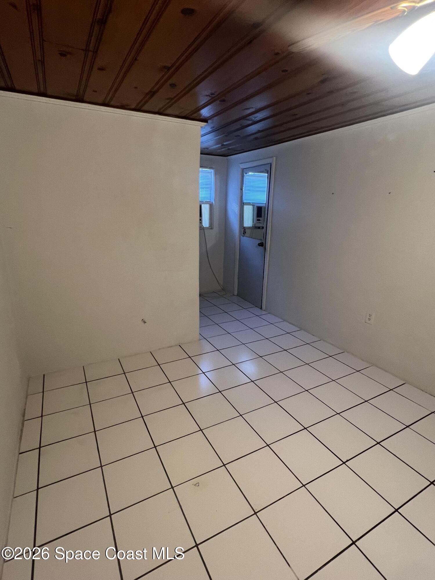 441 Vickers Street, Unit A Melbourne, FL 32935 - Photo 13 of 19 a view of an empty room