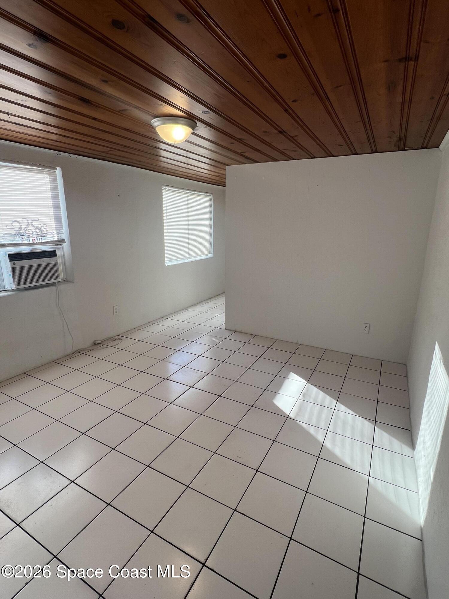 441 Vickers Street, Unit A Melbourne, FL 32935 - Photo 4 of 19 a view of an empty room