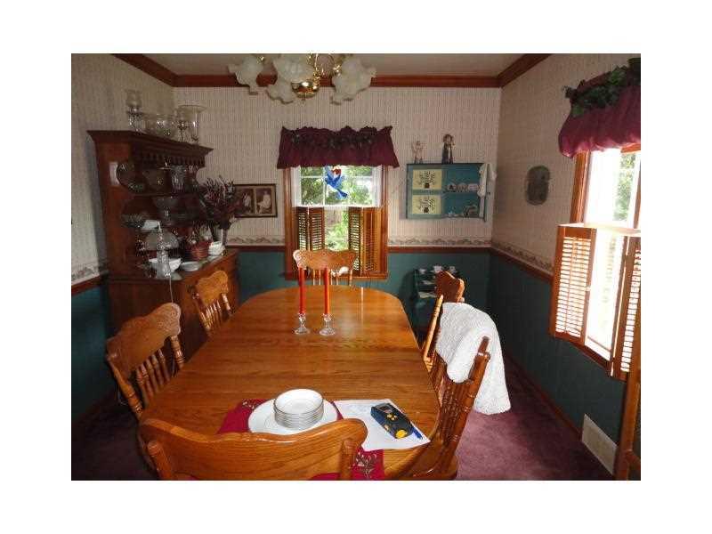 1848 Zehnder Road Economy, PA 15003 - Photo 5 of 22 Dining Room. Spacious room for great family gatherings - chandelier - carpeted - window exposure with wooden shutters