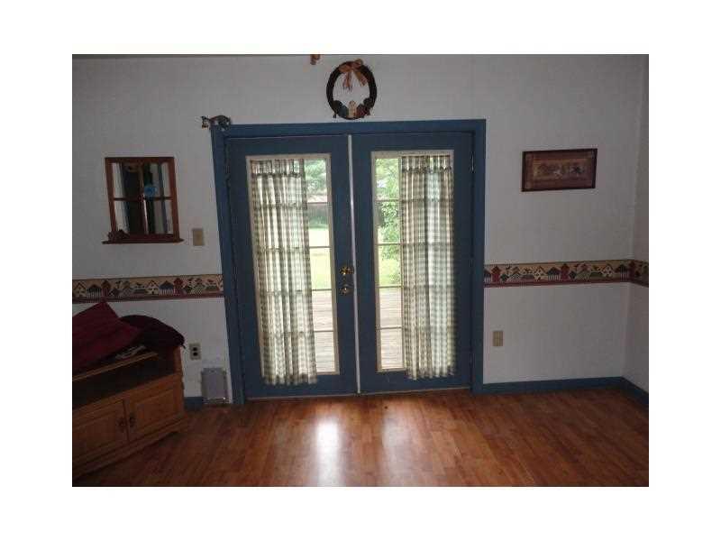 1848 Zehnder Road Economy, PA 15003 - Photo 6 of 22 Den/Family/Great Room. Extra room opens through French doors to the rear patio - room can be used as family room, computer room, hobby area or whatever the new owner wants!