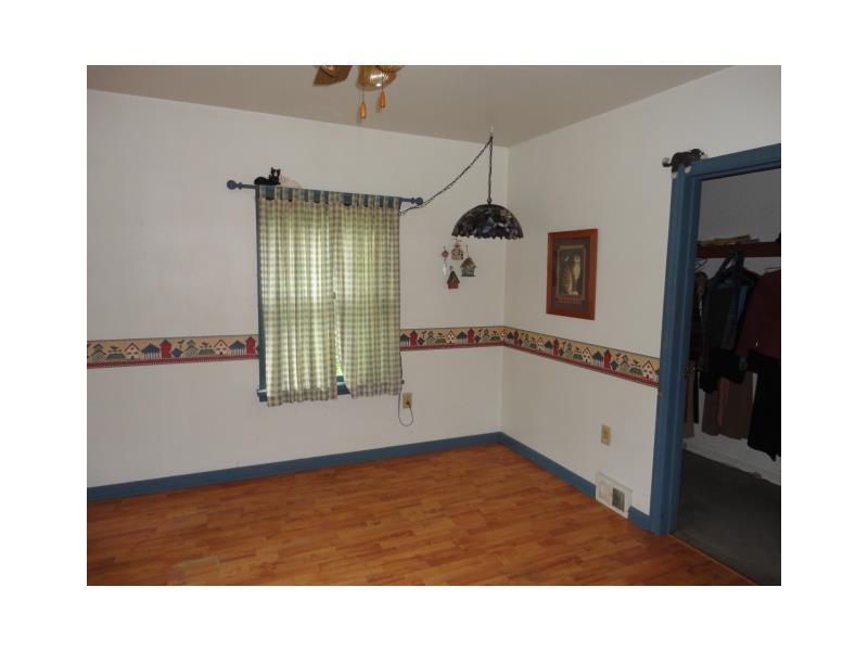 1848 Zehnder Road Economy, PA 15003 - Photo 8 of 22 Den/Family/Great Room. Another view of family room area with hard wood flooring and chair rail