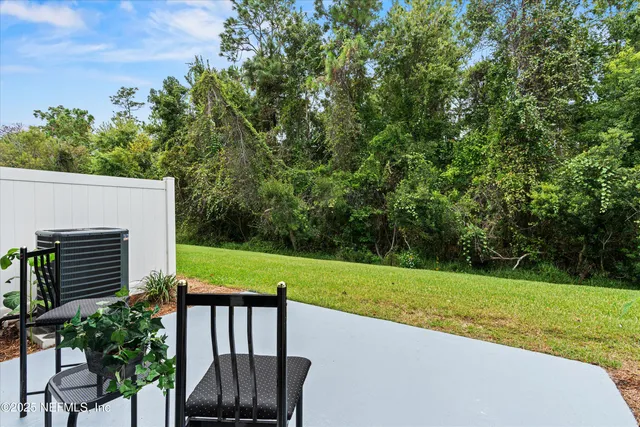 a kitchen with stainless steel appliances a refrigerator sink and a stove
