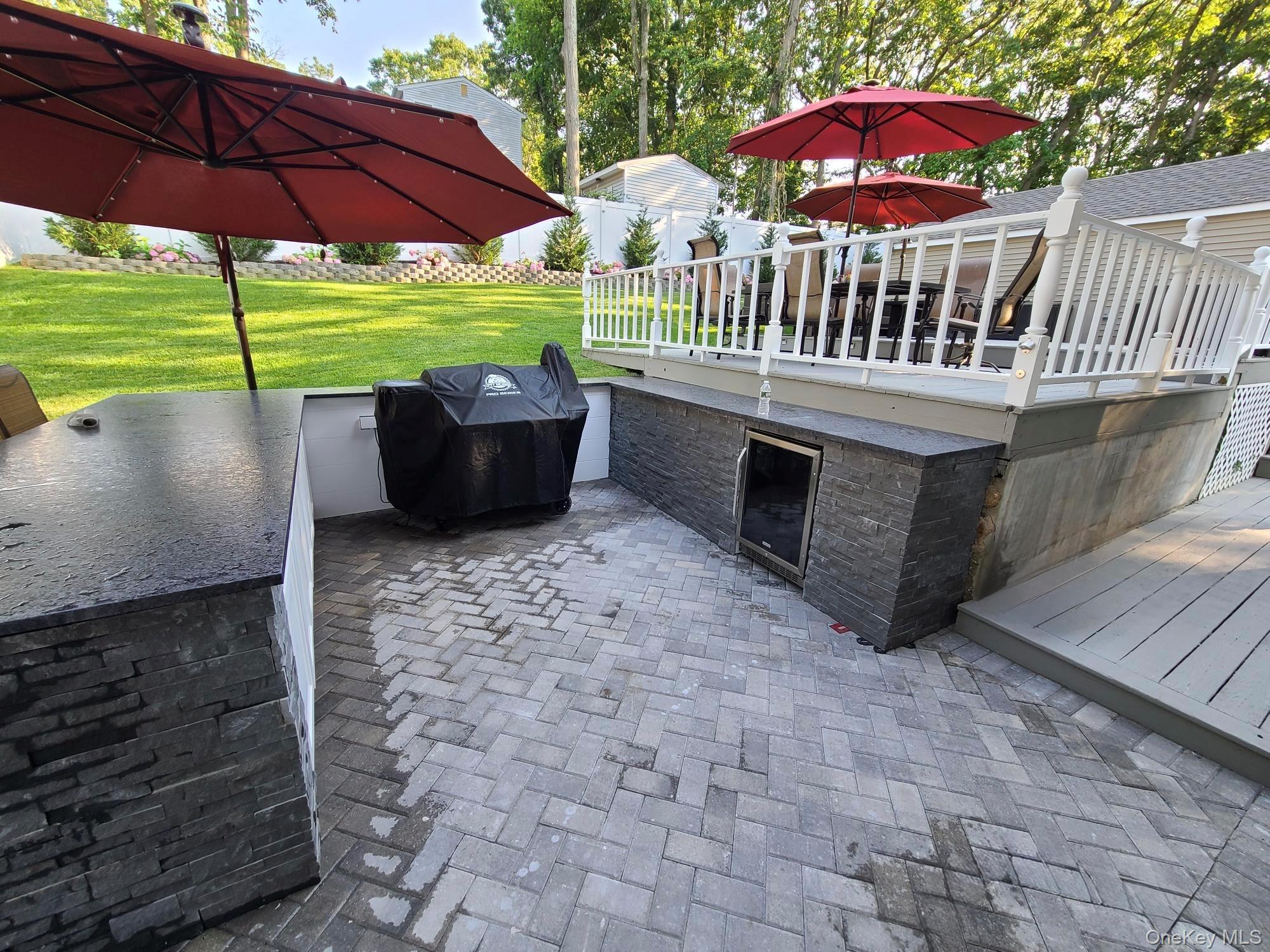 38 Hawthorne Road Rocky Point, NY 11778 - Photo 6 of 30 View of patio featuring a grill and a wooden deck