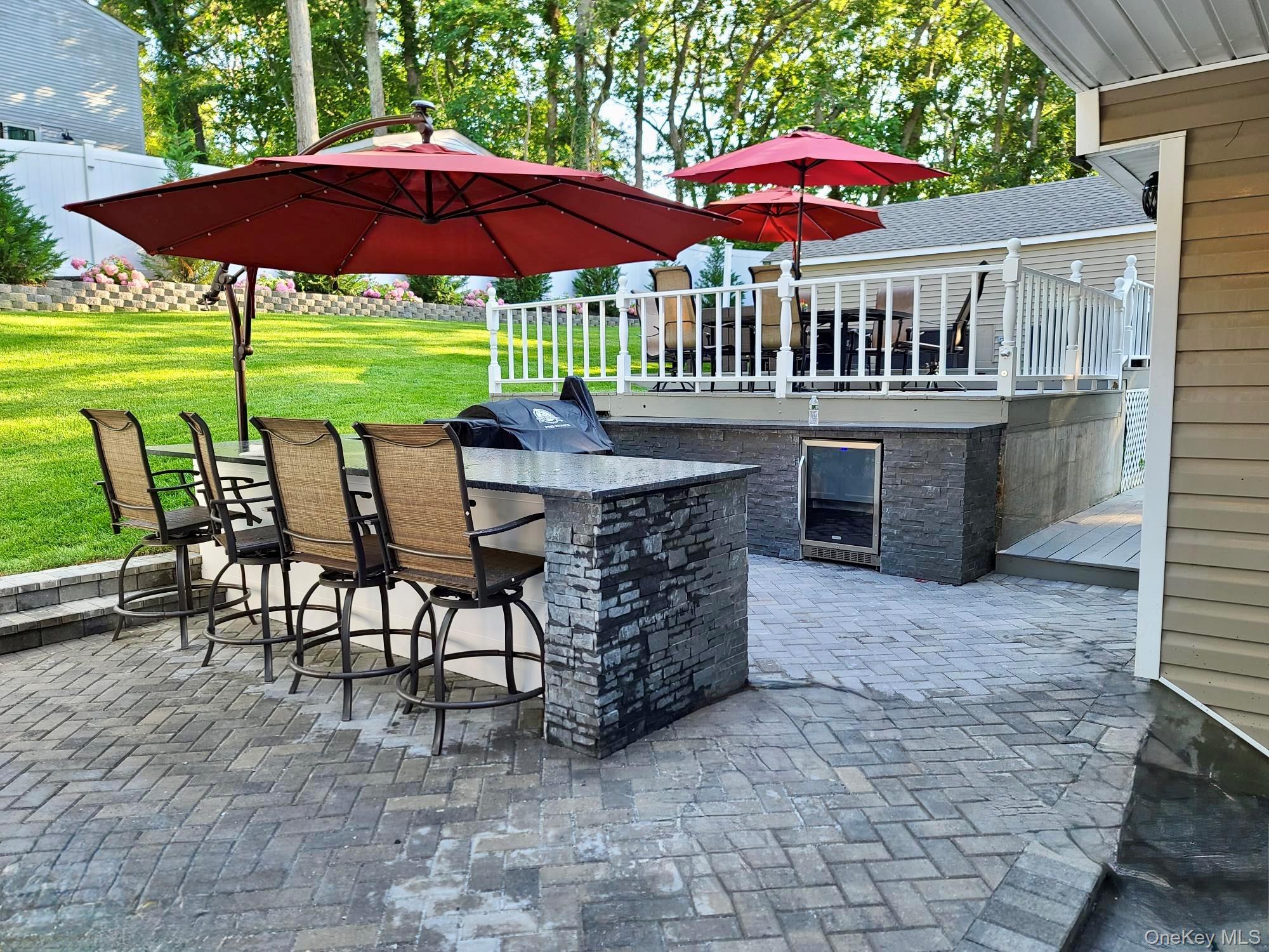 38 Hawthorne Road Rocky Point, NY 11778 - Photo 7 of 30 View of patio featuring exterior kitchen and beverage cooler