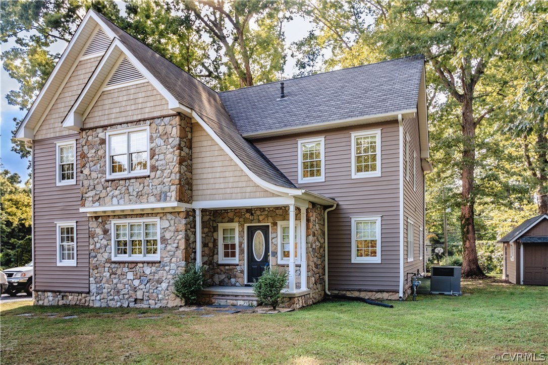 206 North Ridge Road Henrico, VA 23229 - Photo 1 of 30 front view of a house with a yard