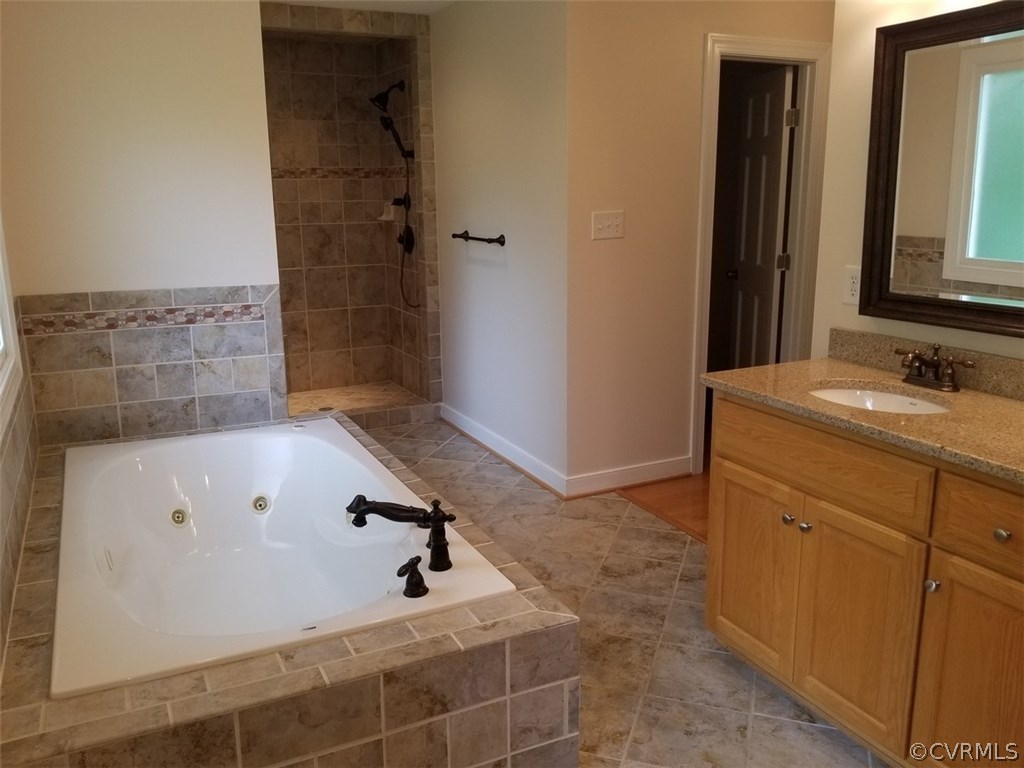206 North Ridge Road Henrico, VA 23229 - Photo 13 of 30 a bathroom with a sink and a mirror