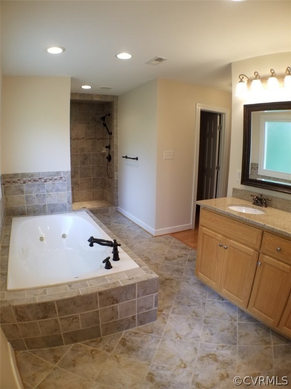 206 North Ridge Road Henrico, VA 23229 - Photo 16 of 30 a bathroom with a tub sink and mirror