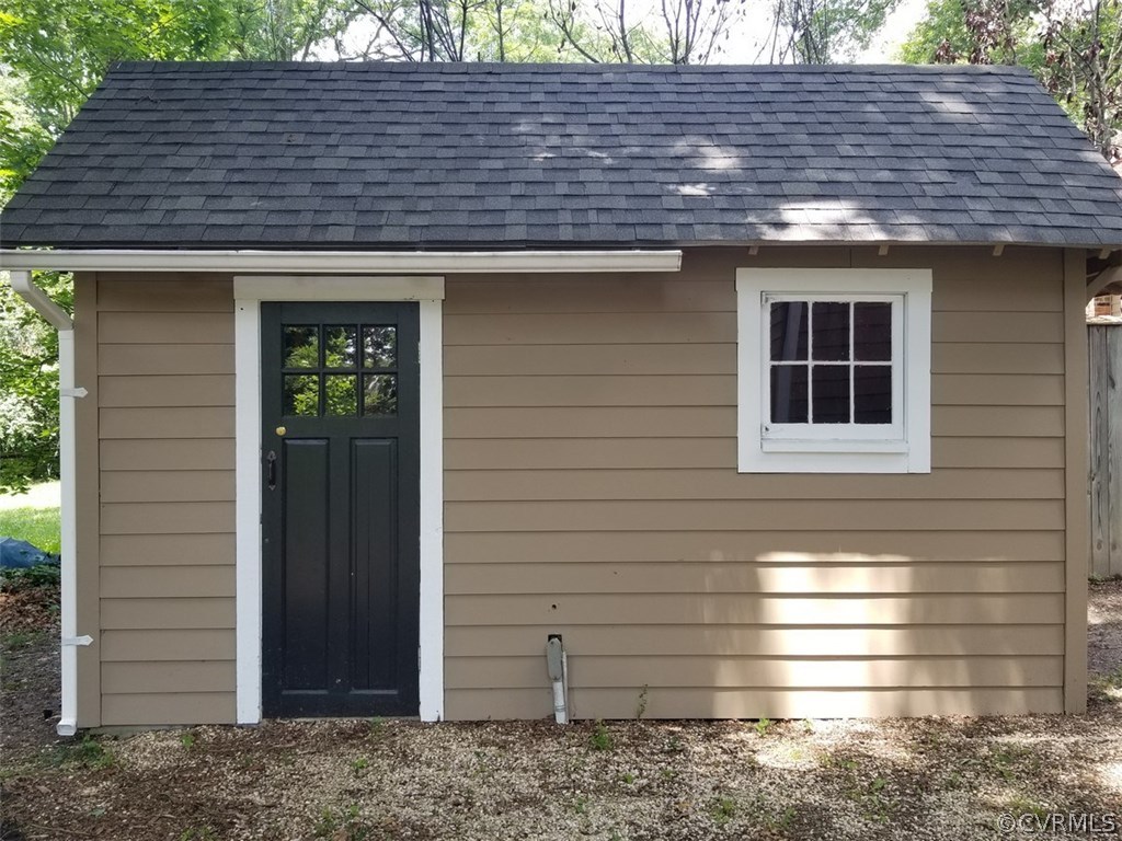 206 North Ridge Road Henrico, VA 23229 - Photo 28 of 30 a front view of a house with a garden