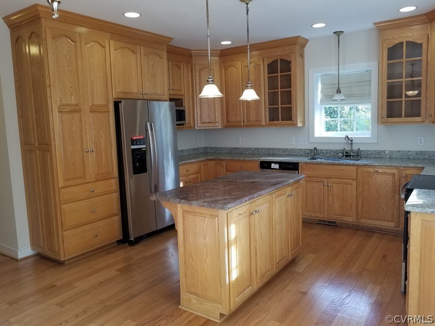 206 North Ridge Road Henrico, VA 23229 - Photo 4 of 30 a kitchen with stainless steel appliances granite countertop a sink a stove a refrigerator and island with wooden floor