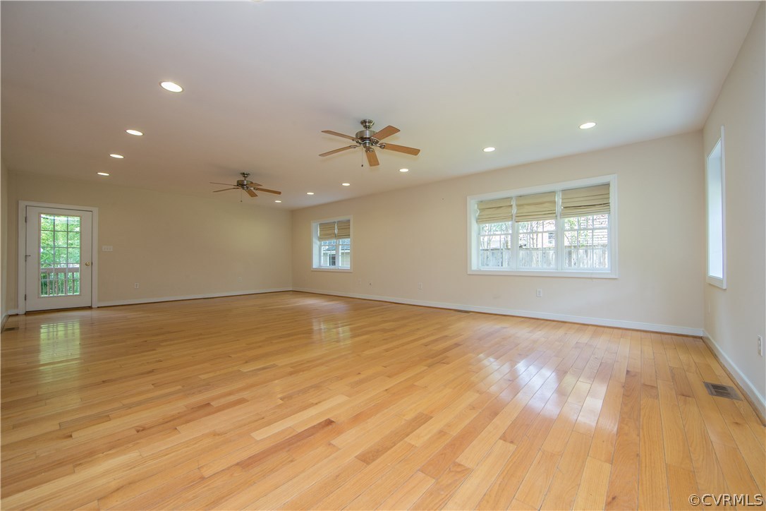 206 North Ridge Road Henrico, VA 23229 - Photo 5 of 30 a view of an empty room with a window and wooden floor