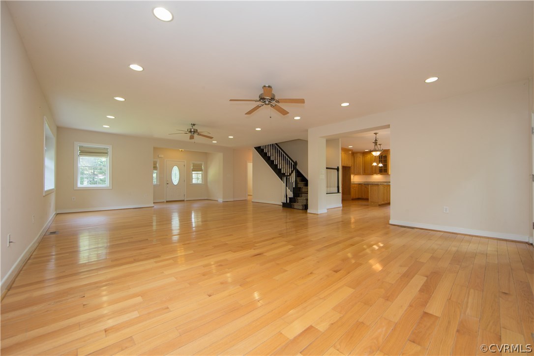 206 North Ridge Road Henrico, VA 23229 - Photo 9 of 30 an empty room with wooden floor and a floor to ceiling window