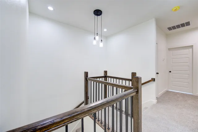 a view of a hallway with closet