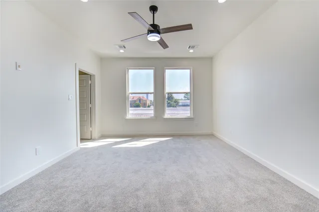 an empty room that has a window