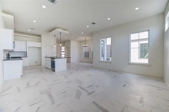 a view of kitchen and windows