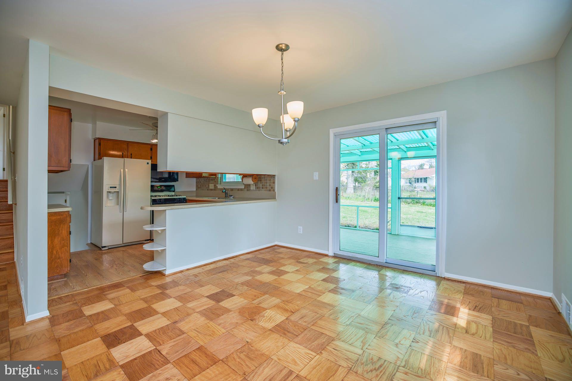 5401 Charlottesville Road Springfield, VA 22151 - Photo 12 of 34 Dining room with doors to enclosed porch