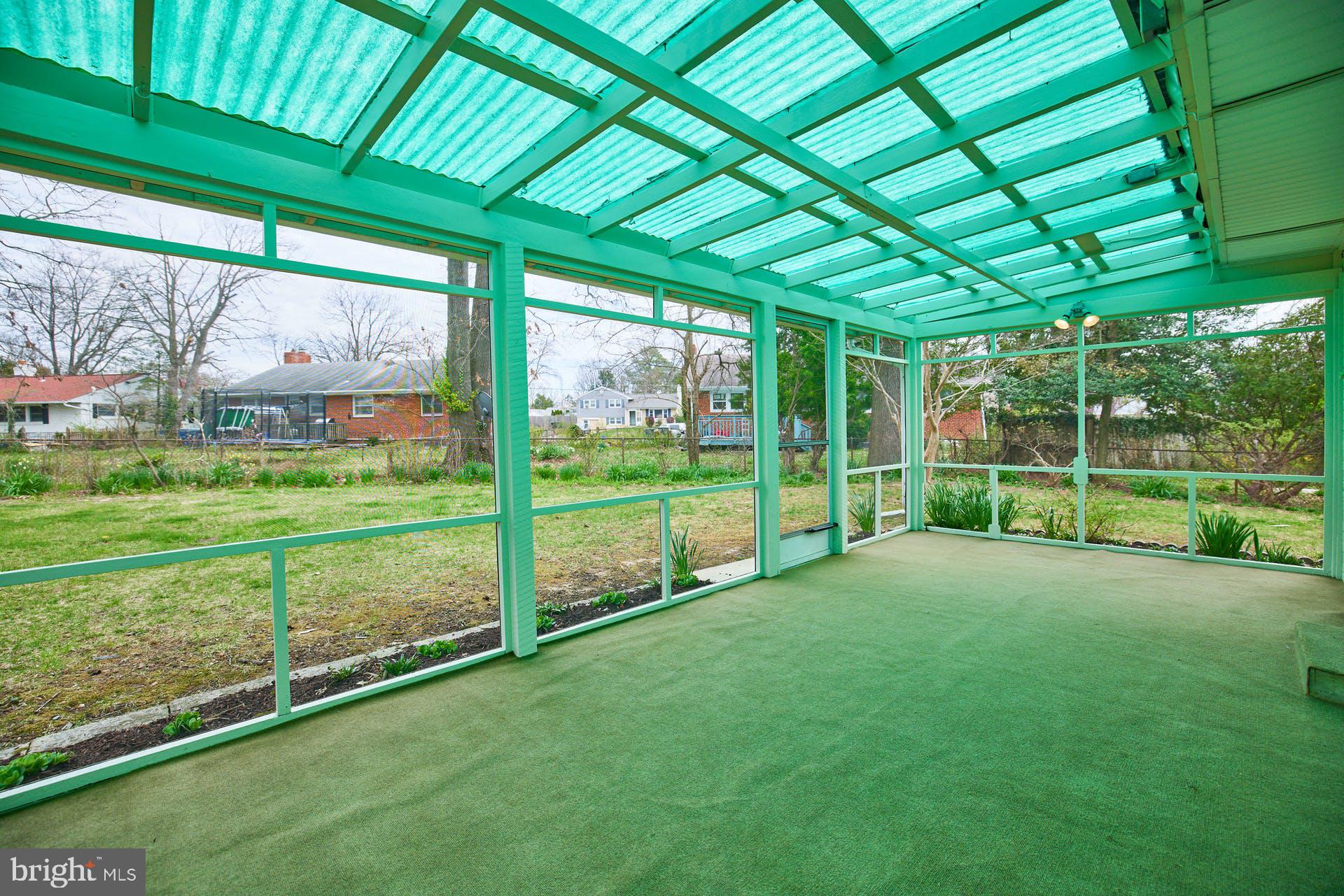 5401 Charlottesville Road Springfield, VA 22151 - Photo 30 of 34 Enclosed porch overlooking level yard