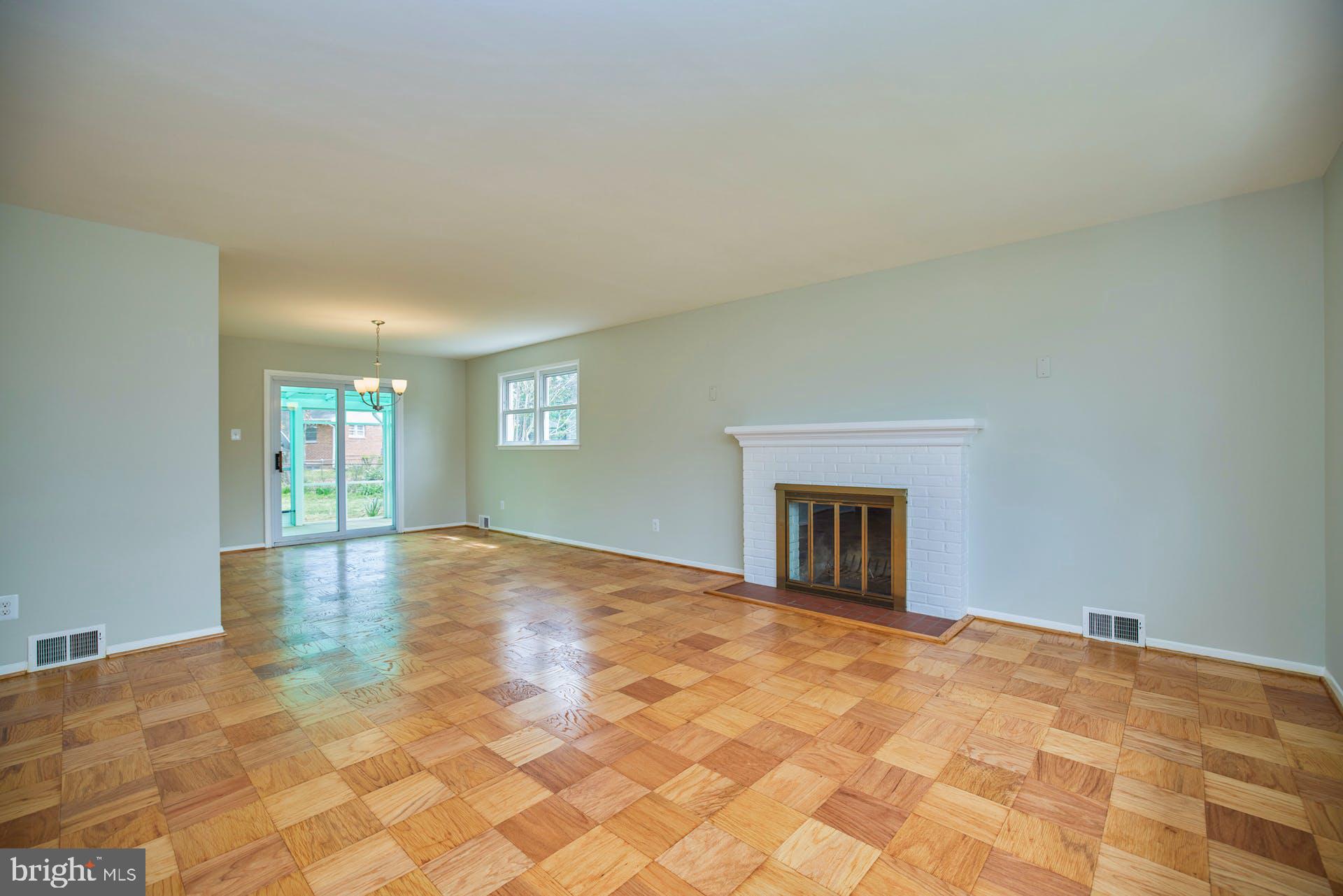 5401 Charlottesville Road Springfield, VA 22151 - Photo 9 of 34 Living room with wood-burning fireplace