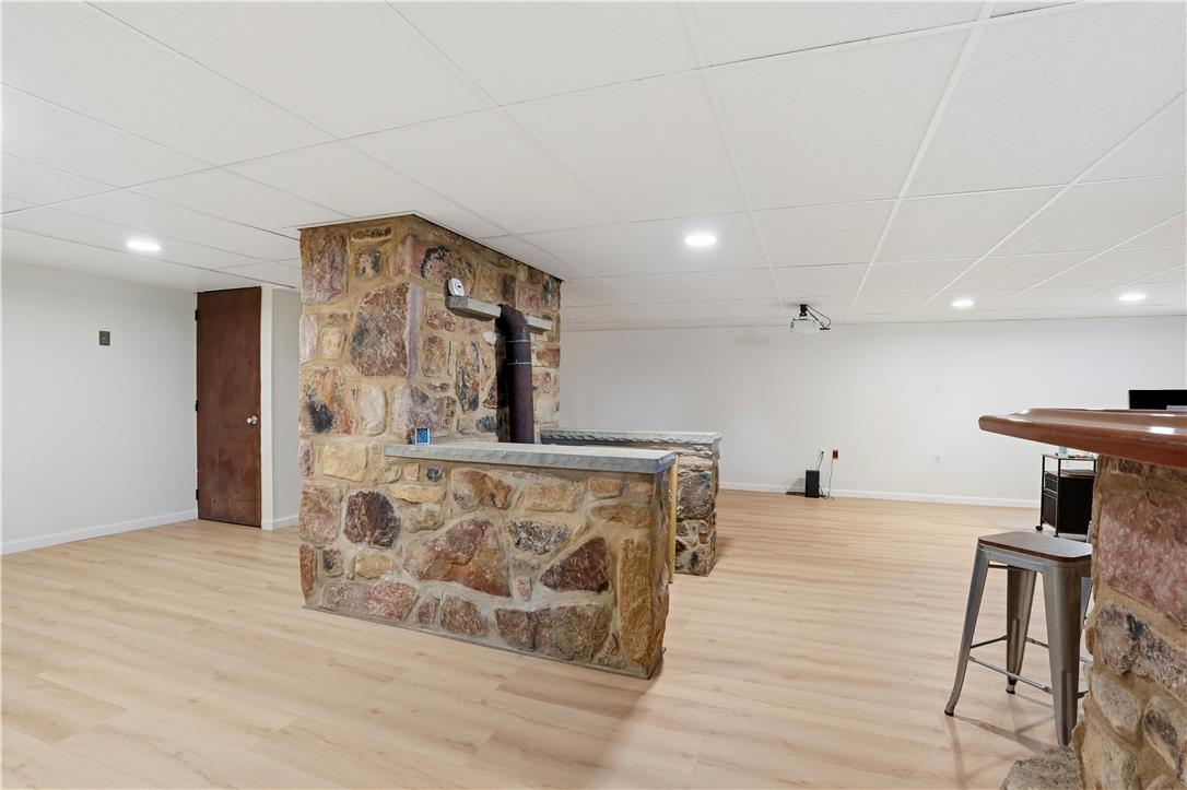 2918 Keystone Street Bethlehem, PA 18020 - Photo 25 of 54 A spacious lower level retreat with stone accents and durable light wood-look flooring.