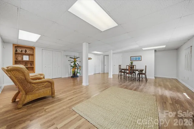 a view of a livingroom with furniture and wooden floor