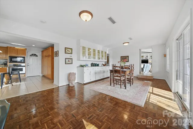 a view of a livingroom with furniture and a table