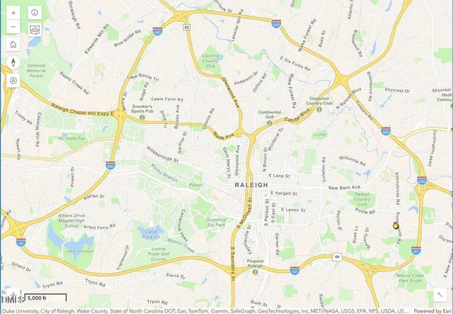 a picture of a park with furniture and a window