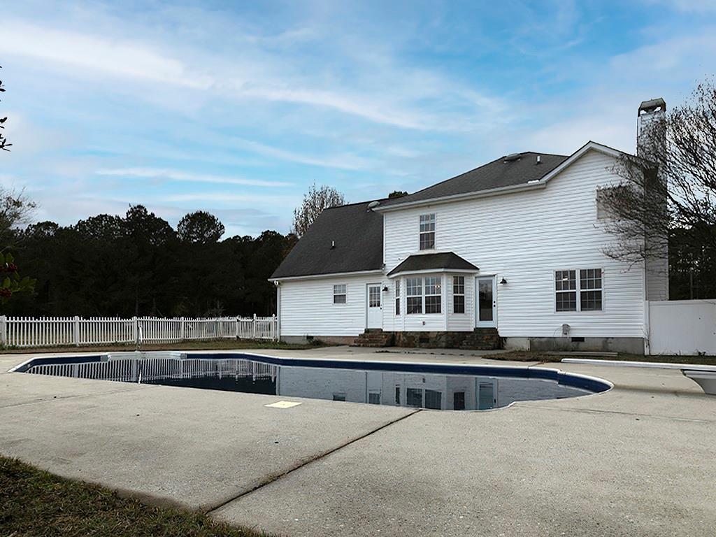 62 Smoak Field Road Griffin, GA 30223 - Photo 22 of 50 a front view of a house with a yard