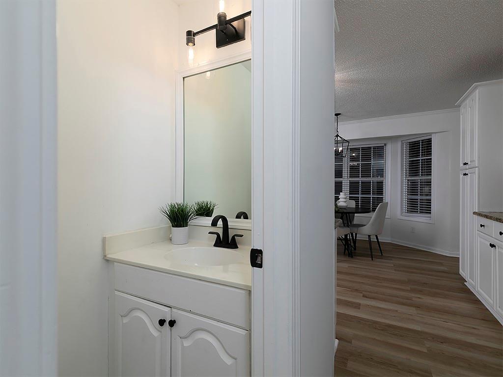 62 Smoak Field Road Griffin, GA 30223 - Photo 25 of 50 a bathroom with a sink and a mirror