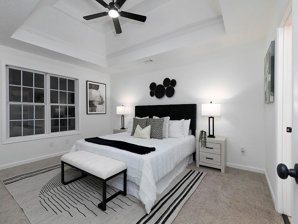 62 Smoak Field Road Griffin, GA 30223 - Photo 28 of 50 a bedroom with a bed and a window