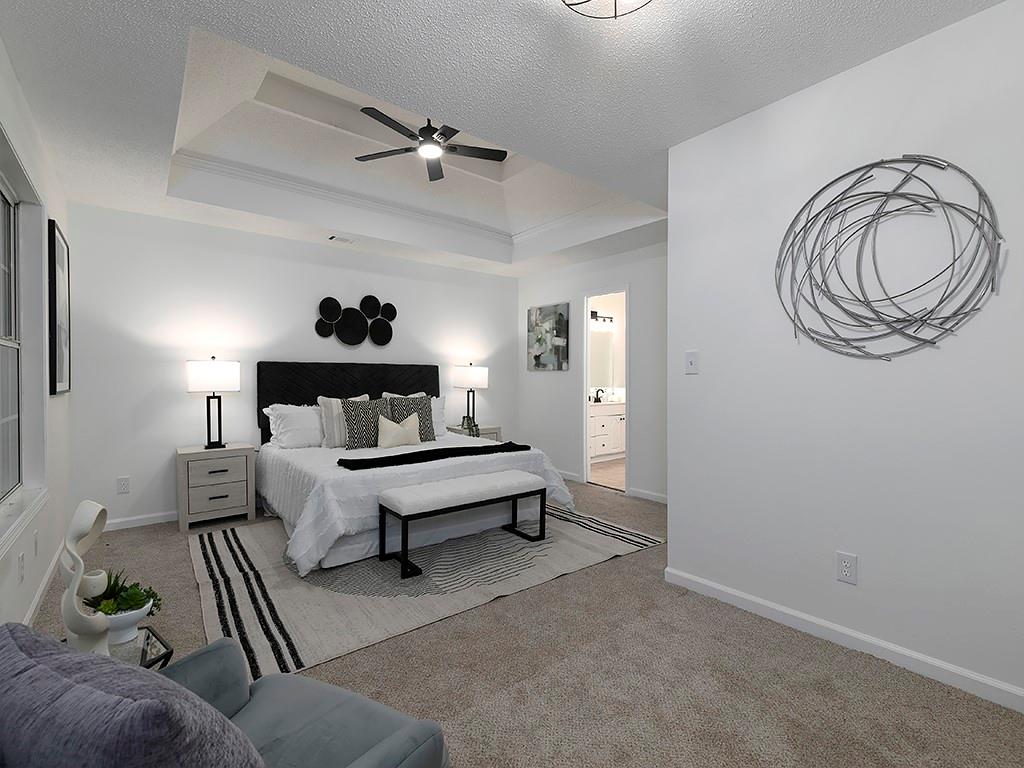 62 Smoak Field Road Griffin, GA 30223 - Photo 29 of 50 a living room with furniture and a mirror