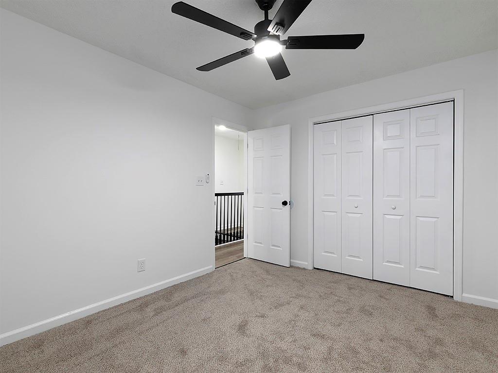 62 Smoak Field Road Griffin, GA 30223 - Photo 35 of 50 an empty room with ceiling fan