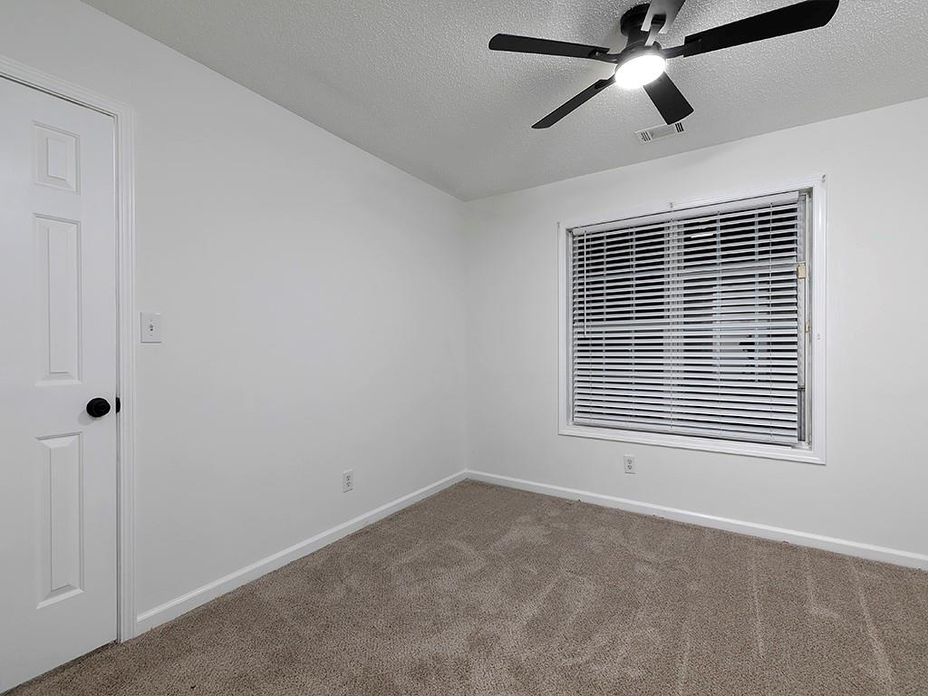 62 Smoak Field Road Griffin, GA 30223 - Photo 36 of 50 a view of an empty room with a window