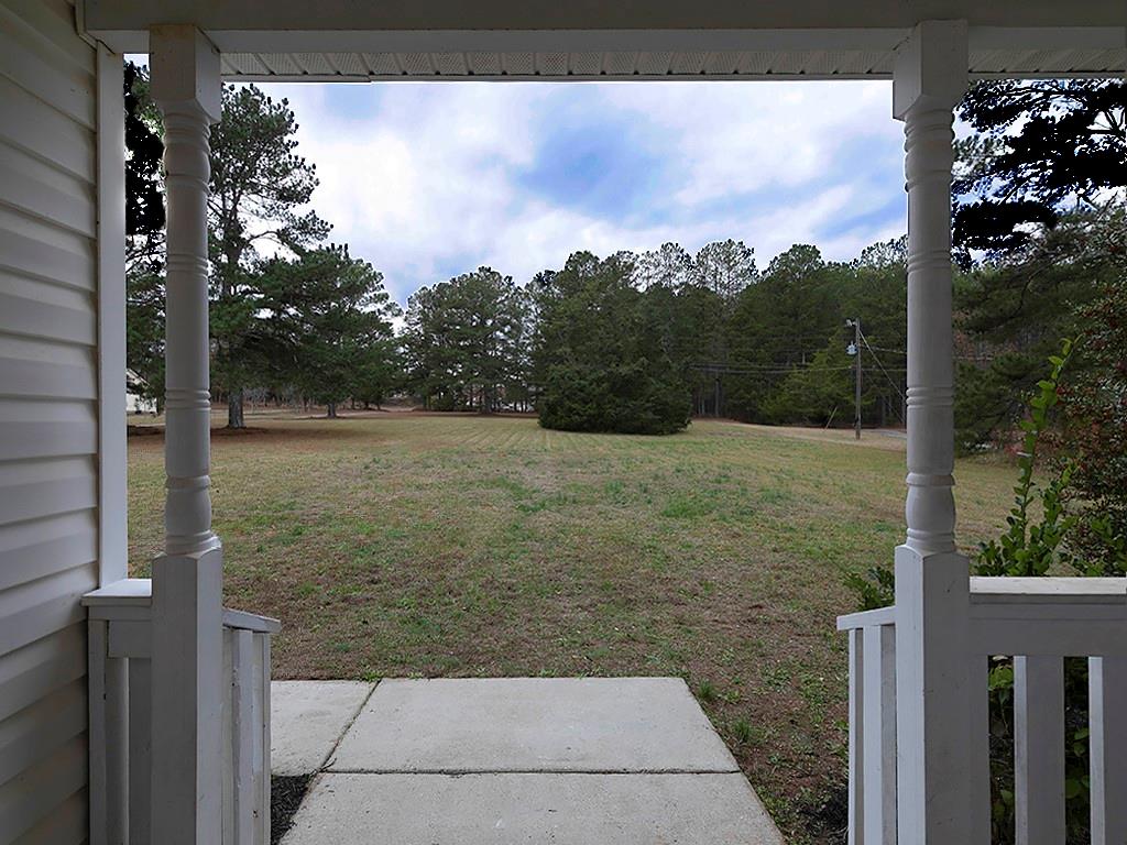 62 Smoak Field Road Griffin, GA 30223 - Photo 4 of 50 a view of a balcony with a tree