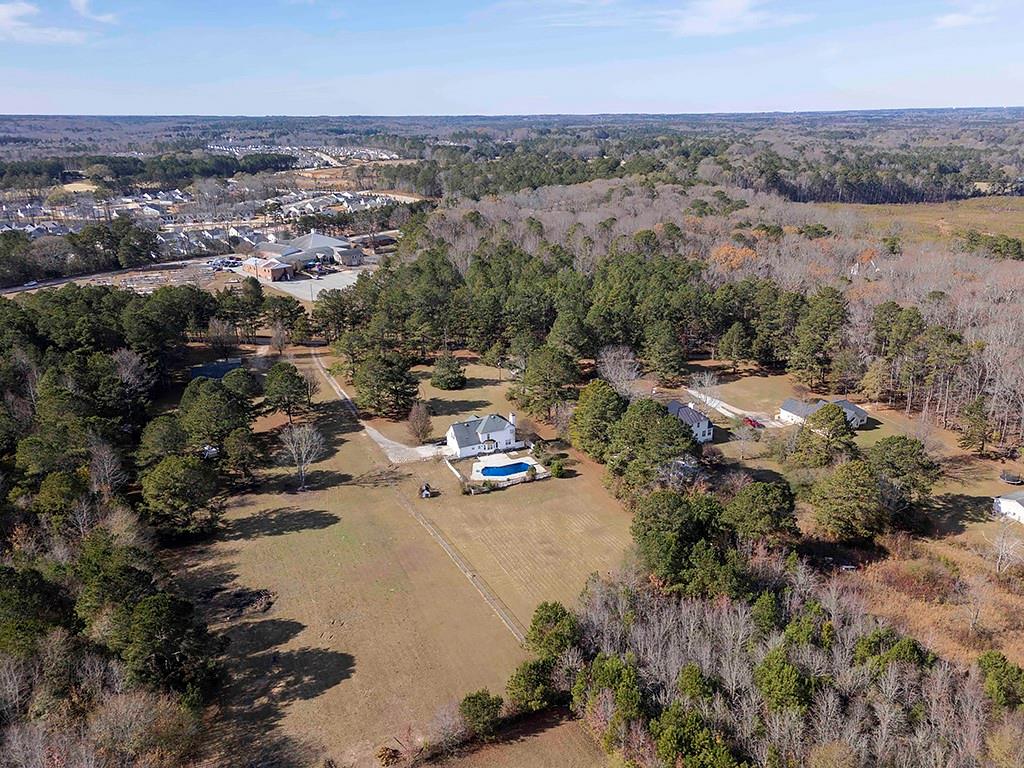 62 Smoak Field Road Griffin, GA 30223 - Photo 45 of 50 an aerial view of a city with lots of residential buildings